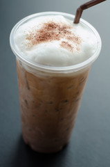 .ice coffee in glass on black background