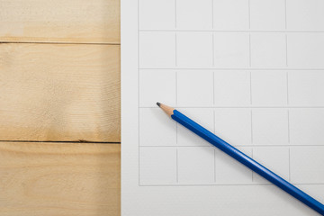 calender date and pencil on wooden background