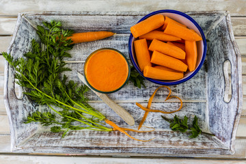 Fresh carrots and carrot juice
