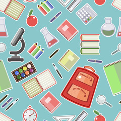 Seamless pattern of school supplies in a flat style.