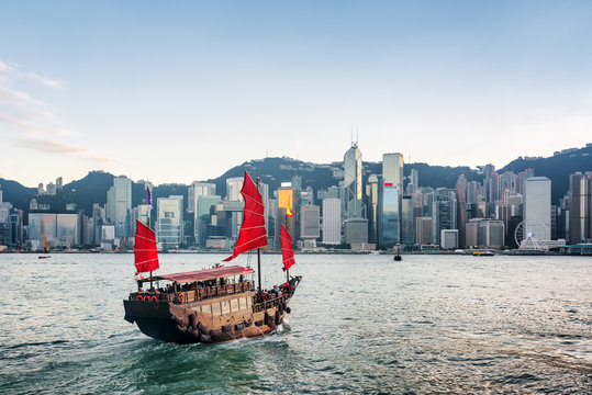 Tourist sailboat crosses Victoria harbor. Hong Kong