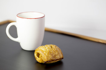 Breakfast croissant and coffee