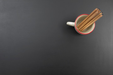 Wood pencil in coffee mug