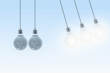 Newton`s Cradle - swinging bulbs