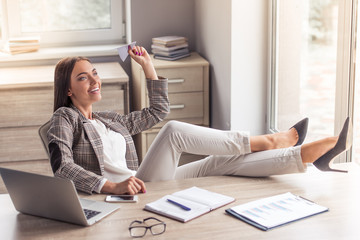Attractive business lady in office