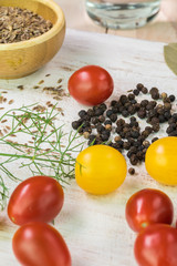 Cherry tomatoes and spices for cherry tomatoes pickles.