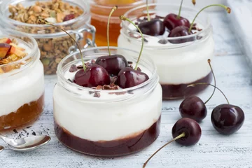 Fototapeten dessert with cream, cherry and peach jam, closeup © cook_inspire