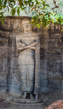 Ancient City of Polonnaruwa, Buddha standing on lotus plinth at Gal Vihara Rock Temple (Gal Viharaya), UNESCO World Heritage Site, Sri Lanka,