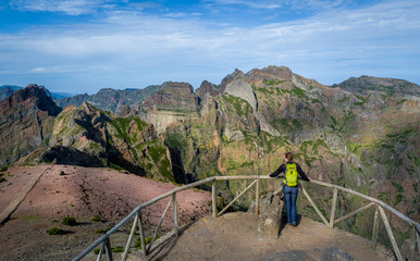 Woman hiker is looking to the Pico Ruivo path. © AlexanderNikiforov