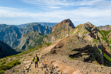 Fototapeta na wymiar Tourist woman walking on the mountains of Madeira island