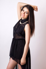 fashion style studio photo of a cute brunette, on white background