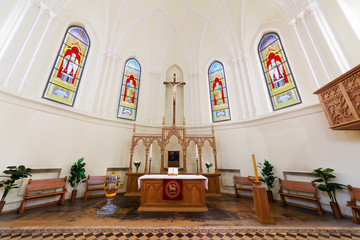 Baroque altar and stained glass windows in the Cathedral of St. Peter and Paul