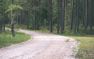 Obraz premium simple country road in summer - vintage film effect