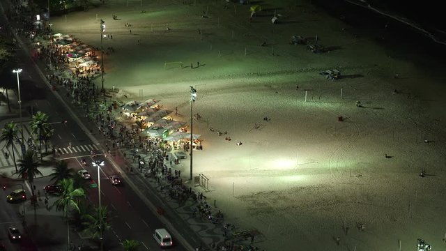 Food stands at night nearby Copacabana Beach, Rio de Janeiro, Brazil