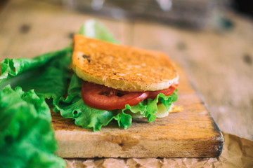 Grilled sandwich with ham and cheese