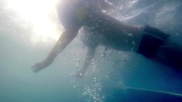 Underwater clip of todler child swimming SLOW MOTION