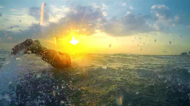 Sportsman Jump Sea Water at Sunset, SLOW MOTION HD