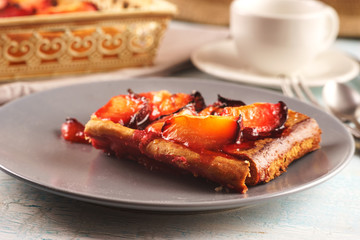 Closeup of a plum cake peace