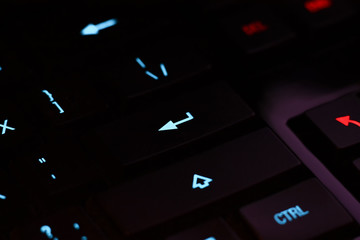 Part of modern black computer keyboard with enter button