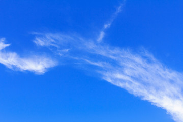 Fototapeta premium Blue sky background with white clouds. The vast blue sky and clouds sky on sunny day. White fluffy clouds in the blue sky.