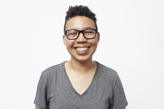 Smiling mixed race woman wearing eyeglasses