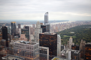 Cityscape with many buildings and tourists at the summer day.