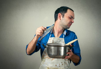 man with the meal in pan and bad smell