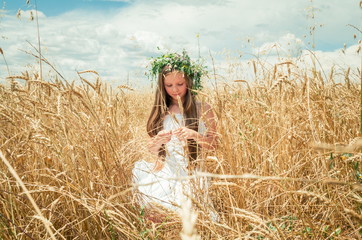 little girl in the wheat field