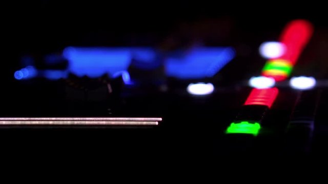  closeup of audio mixer lights at music concert