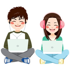 Teenagers sitting on floor with headphones and laptop