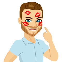 Young happy man showing red lipstick kiss marks on face