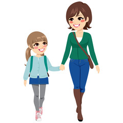 Young mother with her daughter holding hands walking to elementary school