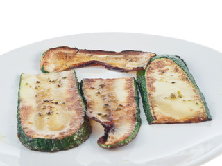 fried zucchini slices on a plate