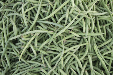 Green beans in bulk on a rural market