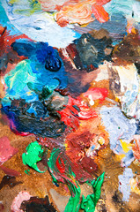 Obraz na płótnie Canvas Oil paints multicolored closeup abstract background