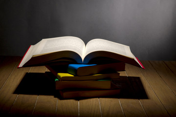 Open Book on wood background
