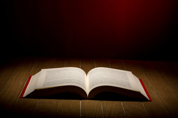 Open Book on wood background