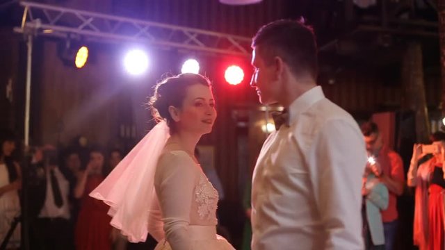 Just married couple is dancing at wedding party