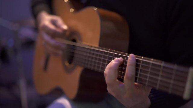 Man Playing Guitar - Close Up