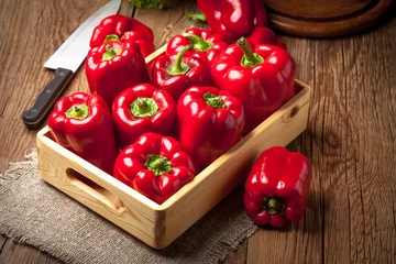 Fotobehang Fresh red sweet peppers. © Arkadiusz Fajer