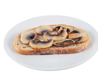 Obraz na płótnie Canvas vegan bread with fried button mushrooms