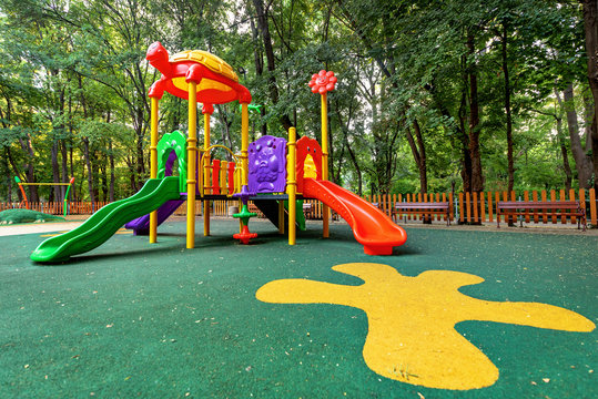 Children playground in the park. Colorful playground in public p