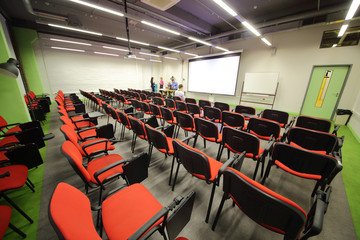 Meeting business room with auditorium and people talk at British Higher School of Art and Design.