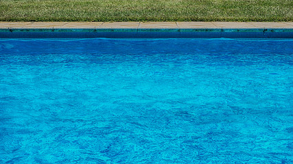 Fototapeta na wymiar Macro from Swimming pool with clear blue water
