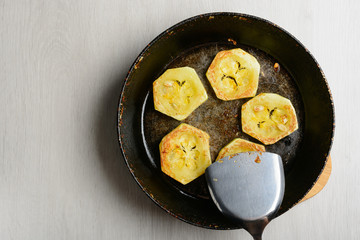 Fried courgette in the pan