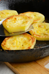 Fried courgette in the pan