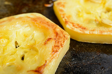 Fried courgette in the pan