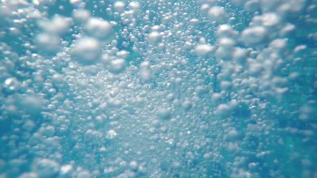 underwater bubbles from thermal spring pool SLOW MOTION