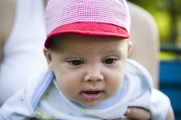 Cute baby wearing cap