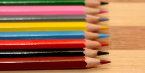 Colored pencils isolated on white background